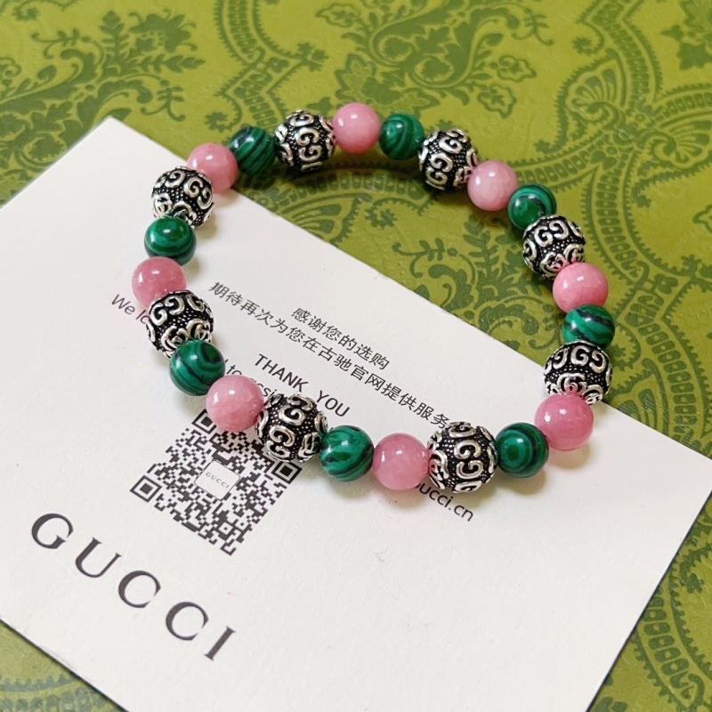 G*u*i bracelets